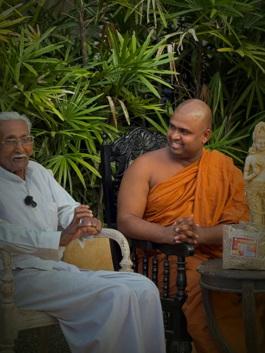 Ven. Somaratana Weda Hamuduruwo, founder of Siri Suwa Arana, seated with the chief physician